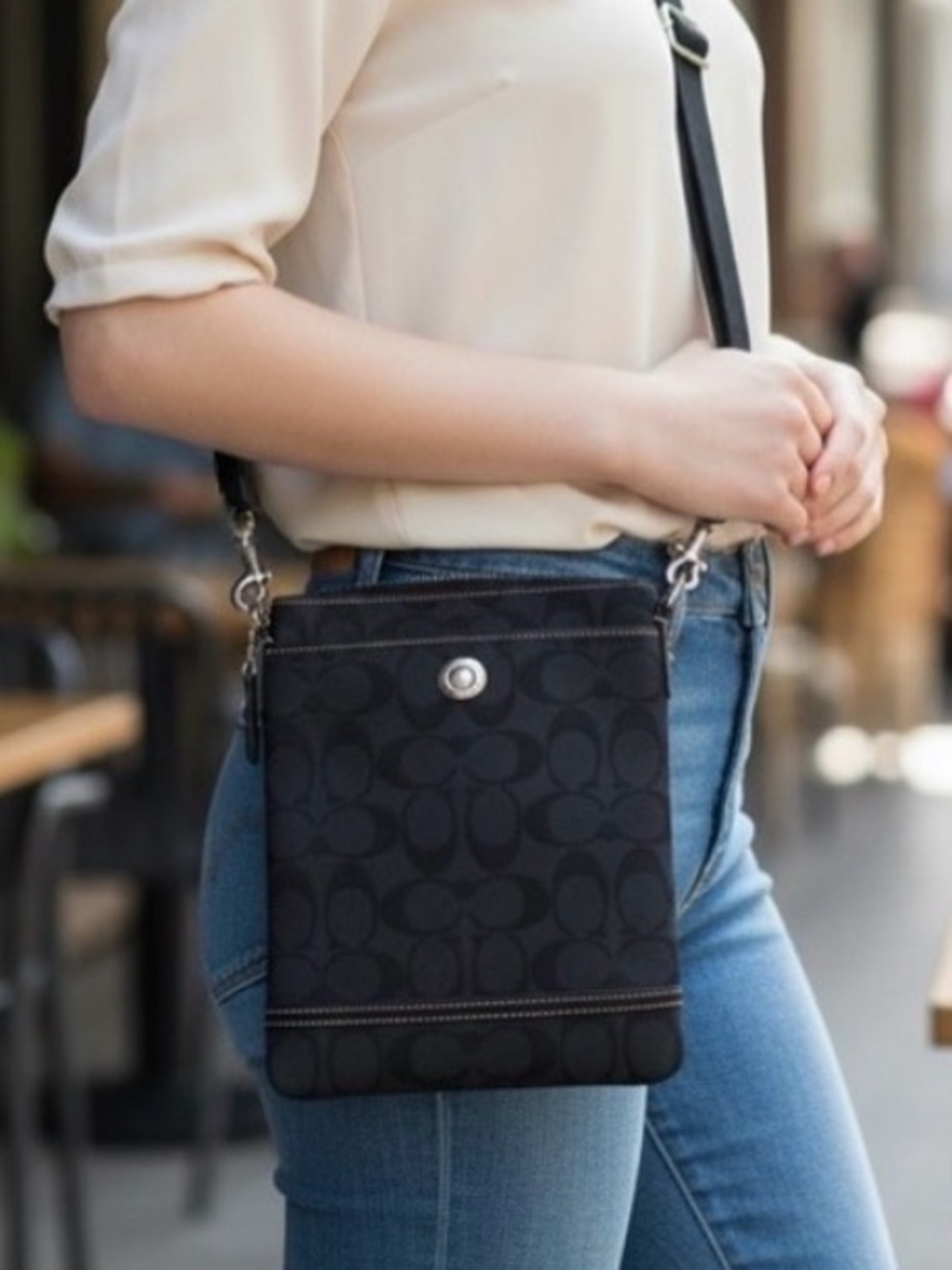 COACH vintage crossbody bag, jacquard black, adjustable strap, zipper top.